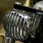 4.5" Retro Round Finned Grill Headlight Lamp For Harley Dyna Cafe Racer Bobber. Fixed Price $29.95.