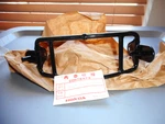 Nos Honda TRX200 TRX250 1983-1985 Genuine Headlight Case Bracket 61311-VM5-000. Fixed Price $47.99.