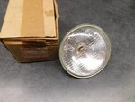 Kawasaki KE175 Head Light Lens Unit Nos 23007-068 2330. Fixed Price $189.00.