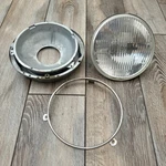 Oem Harley Davidson 7" Bosch H4 Headlight Housing Bracket Trim Bezel 1305603038. Fixed Price $38.67.