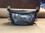 97 Suzuki Headlight Oem #35100-21E00-999. Fixed Price $45.00.