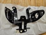 New Oem Yamaha Headlight Stay 1L9-23121-01-33 Fits 76-77 XS360 & 77-78 XS400. Fixed Price $30.00.