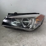 (dmg) 2013-15 Bmw X1 Front Left Driver Side Headlight Lamp Xenon Oem. Fixed Price $250.00.