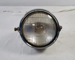 KE175 Kawasaki Stanley 61035 Headlight. Fixed Price $45.00.