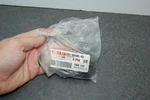 New Genuine Yamaha 2GU-84345-00 Headlight Housing Rubber Damper (QTY-3) Oem. Fixed Price $30.00.